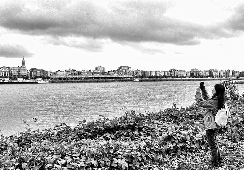 File:Girl taking a photo at river Scheldt by jules grandgagnage.jpg