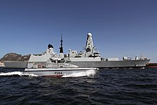 Daring arrives in Gibraltar in 2016, escorted by HMS Scimitar HMS DARING sails in British Gibraltar territorial waters MOD 45160521.jpg