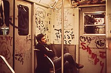 A heavily tagged subway car in New York City in 1973 Heavily tagged subway car in NY.jpg