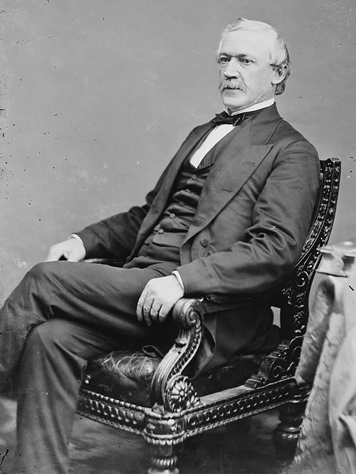 Image: Hiram Mc Collough   photo portrait seated