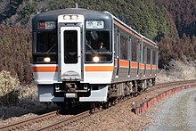 A Kasuga express train in a rural section. The photo was taken in March 2006, shortly before the service was discontinued. JR-Tokai Express Kasuga 002 JPN.jpg
