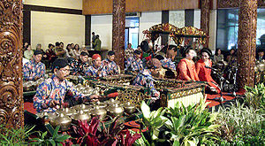 Javanese gamelan ensemble performance during traditional Javanese Yogyakarta style wedding ceremony at Sasono Utomo, Taman Mini Indonesia Indah, Jakarta, Indonesia. Javanese Gamelan.jpg