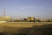 The Al-Jizah reservoir, dating back to the Pax Romana, and the Mamluk building which was refitted by the Ottoman for Sattam to govern from. Jizah Reservoir and Mamluk Building.jpg