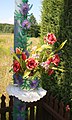 * Nomination Plastic flowers on a waydside cross, Krowica, Poland. By User:Przykuta --Mechanik rowerowy 09:15, 9 December 2023 (UTC) * Promotion  Support Good quality. --Plozessor 10:56, 9 December 2023 (UTC)