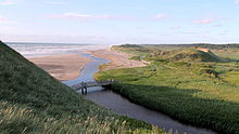 Coastal dunes covered in grasses around the mouth of the Liver A river in Denmark LIVER AAS UDLOEB I JULI 2012 (ubt)-002.JPG