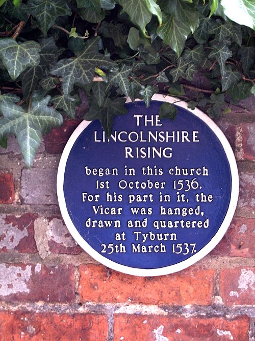 Plaque commemorating the Lincolnshire Rising, opposite south entrance to St James' Church, Louth