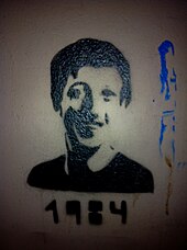 Graffiti in Berlin of Facebook founder Mark Zuckerberg. The caption is a reference to George Orwell's novel Nineteen Eighty-Four. Mark Zuckerberg 1984 Berlin Graffiti.jpg
