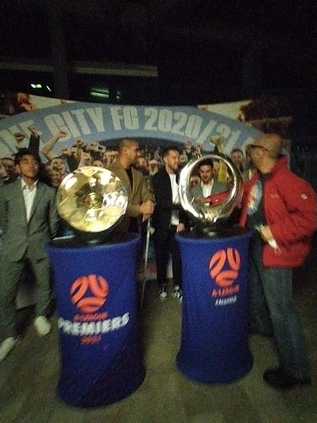 Melbourne City celebrating their 2020–21 A-League Premiership and Championship trophies at Federation Square