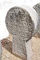 Stèle discoïdale du cimetière de Gréciette