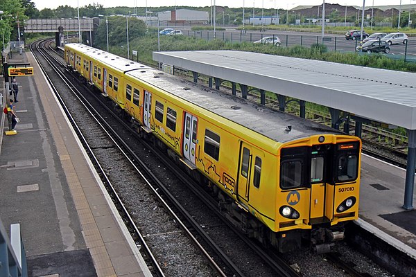 Facing towards Birkenhead North TMD, which is at top centre. The new station car park is visible to the top right.