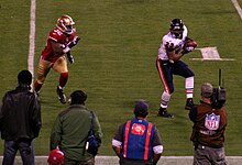 Forte attempts to escape from San Francisco 49ers safety Michael Lewis in a 2009 meeting Michael Lewis Matt Forte.jpg