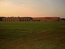 The rear of Miller Place High School, as viewed from a district athletic field. Miller Place High School.jpg