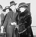 Mr. and Mrs. Arthur Lueder voting at the front of a line in a room (1).jpg