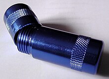 A nitrous oxide "cracker" device, for releasing the gas from whipped cream aerosol chargers. N2O cracker.jpg