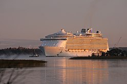 Leaving the Turku shipyard, with flue pipes retracted to allow the ship to clear the Great Belt Bridge later in the day[44]