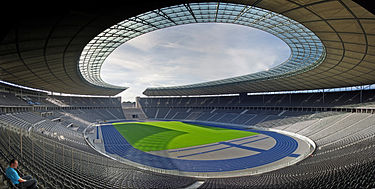 Berlin's Olympic Stadium in 2007. For the 1936 Summer Olympics, the venue hosted athletics, equestrian jumping, and the finals for both football and handball. Olympicstadium2.jpg