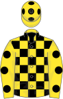 Yellow and black check, yellow sleeves, black spots, yellow cap, black spots