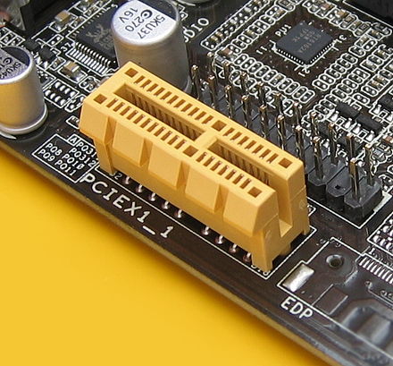 An open-end PCI Express x1 connector lets longer cards that use more lanes be plugged while operating at x1 speeds