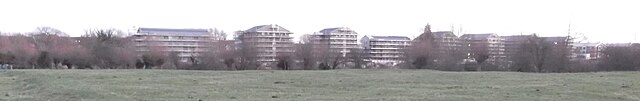 Panoramic view looking south from Port Meadow of new Oxford University Castle Mill graduate housing