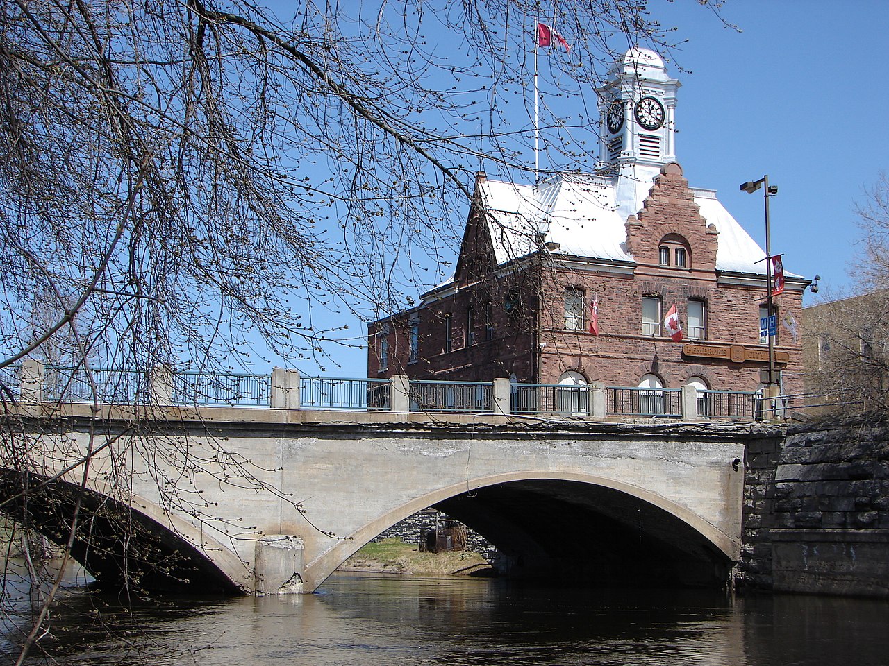 Pembroke Street Bridge crossing the Muskrat River, with City Hall in the background.