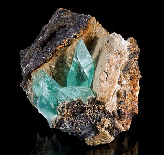 <span class="mw-page-title-main">Phosphophyllite</span> Rare mineral (Zn₂Fe(PO₄)₂•4H₂O)