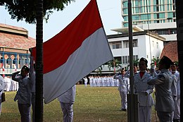 Paskibra students hoisting the flag of Indonesia in their school Raising Flag in Canisius College.jpg