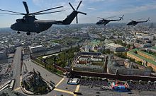 Mi-26 and two Mi-17s fly over the Red Square Russian Air Force helicopters over Red Square as part of the flypast for the 2015 Victory Day Parade.jpg