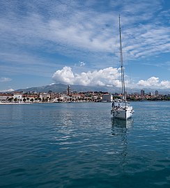 Sailing vessel approaching the marine petrol station, Riva promenade, Split, Croatia