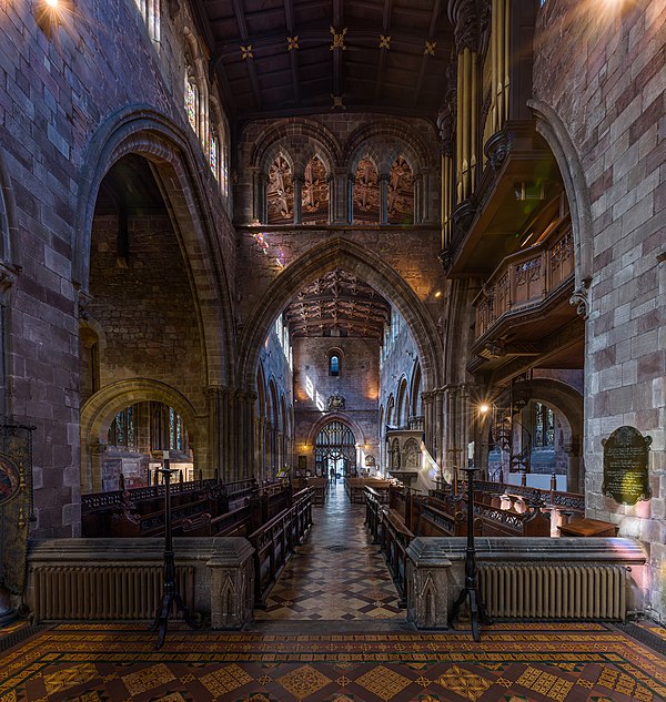 The choir, organ, pulpit and stained glass windows