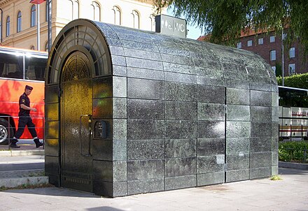 A public toilet booth. Can be clean or messy.