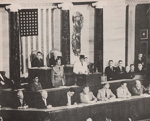 Indonesian president Sukarno addresses Congress in 1956. Sitting behind him Vice President Nixon and Speaker Rayburn.