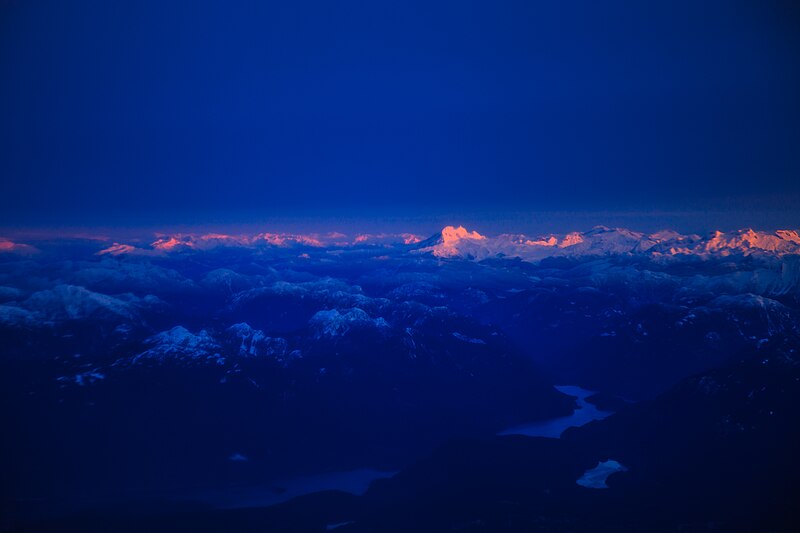 File:Sunrise from the air on the Coast Mtns E of Vancouver (15937430316).jpg