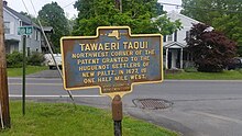 a picture of the marker, showing that it is at a street corner