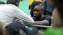 Tamgho in discussion with his coach at the 2009 Meeting Areva. Teddy Tamgho Meeting Areva 2009.jpg