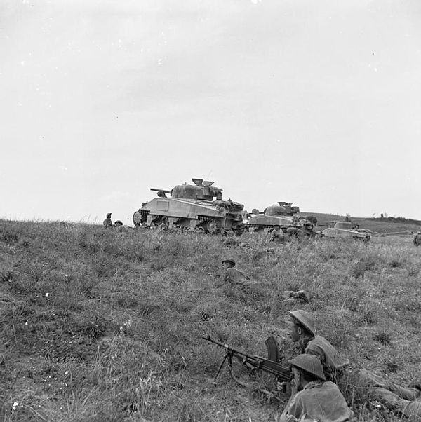 Sherman tanks supporting infantrymen of the 2/5th Battalion, Leicestershire Regiment, 46th Division, near Coldazzo on the Gothic Line, 30 August 1944.