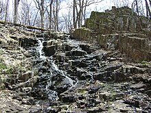 Water flows over a trap rock surface in the Watchungs