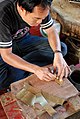 A craftsman at Wat Phuak Taem in Chiang Mai