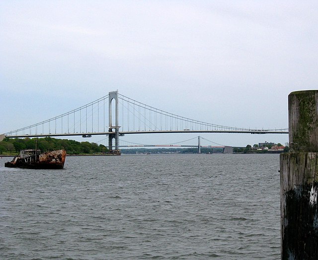 Bronx-Whitestone Bridge between the Bronx and Queens. The Throgs Neck Bridge, also between the Bronx and Queens, is visible in the background.