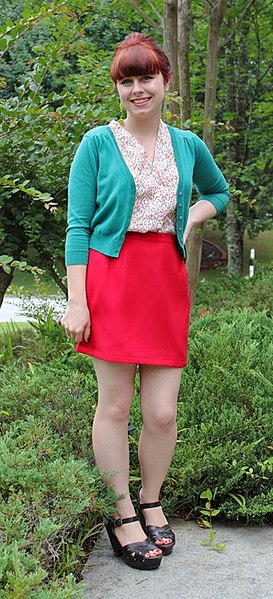 File:Woman in a red miniskirt and green cardigan crop.jpg