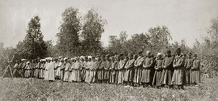 Bashkirs in the midday prayer in the vicinity of the village Muldakaevo. Photo by Maxim Dmitriev, 1890