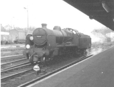 K class rebuild number 31803 at Bournemouth during the British Railways era. Note the double spectacle plates on the left-hand cab front next to the b