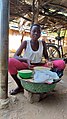 A young lady selling shea butter in Ghana.jpg