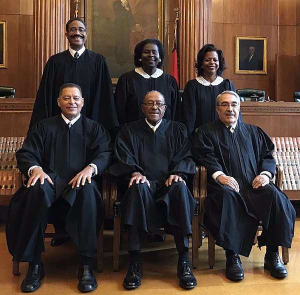 Six former African American justices of the North Carolina Supreme Court (back to front, left to right): Michael R. Morgan, Patricia Timmons-Goodson, 