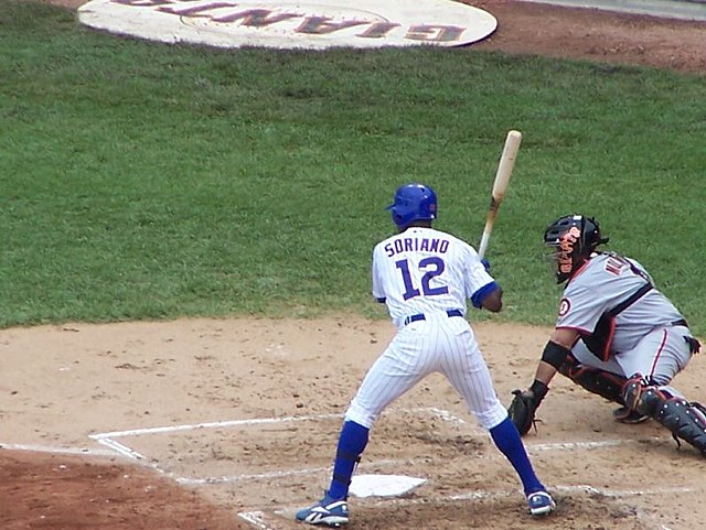 Washington Nationals' Alfonso Soriano hits a single against the Milwaukee  Brewers during the first inning of a baseball game Saturday, Sept. 16,  2006, in Washington. The Nationals won 8-5. (AP Photo/Nick Wass