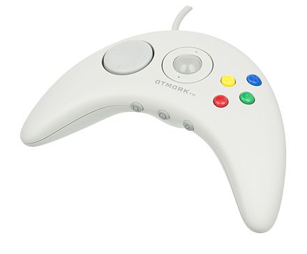 An Apple Pippin gamepad with a trackball.