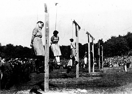 Execution of guards and kapos of the Stutthof concentration camp on 4 July 1946 by short-drop hanging. In the foreground were the female overseers: Jenny-Wanda Barkmann, Ewa Paradies, Elisabeth Becker, Wanda Klaff, Gerda Steinhoff (left to right)