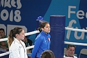 Deutsch: Boxen bei den Olympischen Jugendspielen 2018 Tag 12, 18. Oktober 2018 - Medaillenzeremonie im Fliegengewicht der Mädchen - Gold: Martina La Piana (Italien), Silber: Adijat Gbadamosi (Nigeria), Bronze: Heaven Destiny Garcia (USA); Medaillenübergabe durch Habu Gumel (IOC, Nigeria), Geschenkübergabe durch Dr. Joseph O. Ayeni (Nigeria, AIBA). English: Boxing at the 2018 Summer Youth Olympics on 18 October 2018 – Girl's flyweight Medal Ceremony - Gold: Martina La Piana (Italy), Silver: Adijat Gbadamosi (Nigeria), Bronze: Heaven Destiny Garcia (USA); Medal handover by Habu Gumel (IOC, Nigeria), Gift presented by Dr. Joseph O. Ayeni (Nigeria, AIBA). Español: Boxeo en los Juegos Olímpicos Juveniles de Verano de 2018 en 18 de octubre de 2018 - Ceremonia de la Medalla de peso mosca para niñas - Oro: Martina La Piana (Italia), Plata: Adijat Gbadamosi (Nigeria), Bronce: Heaven Destiny Garcia (Estados Unidos); Entrega de medallas por Habu Gumel (COI, Nigeria), Regalo presentado por Joseph O. Ayeni (Nigeria, AIBA).