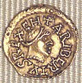 A Banassacban vert meroving érmék egyike (II. Caribert tremissise)