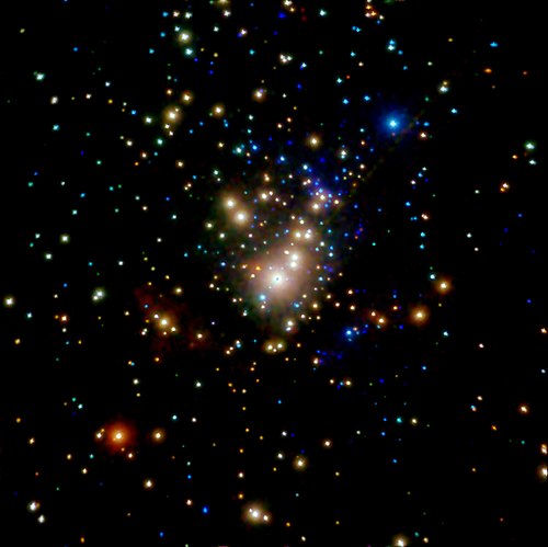 The embedded Trapezium cluster seen in X-rays which penetrate the surrounding clouds