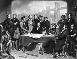 Conference of Engineers at the Menai Straits Preparatory to Floating one of the Tubes of the Britannia Bridge by John Lucas.jpg